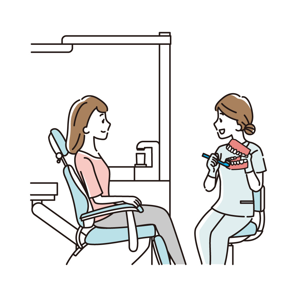 歯科スタッフが歯の模型と歯ブラシを使って患者に歯磨きを説明するイラスト