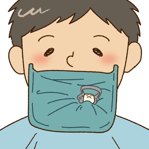 ラバーダムで治療する歯を周囲から隔離した図
