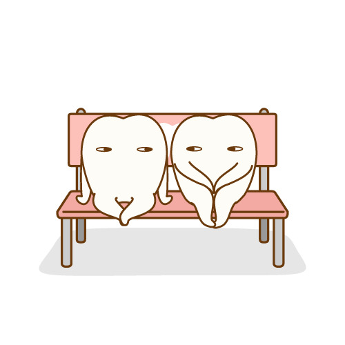 ベンチに並んで座る歯のキャラクター
